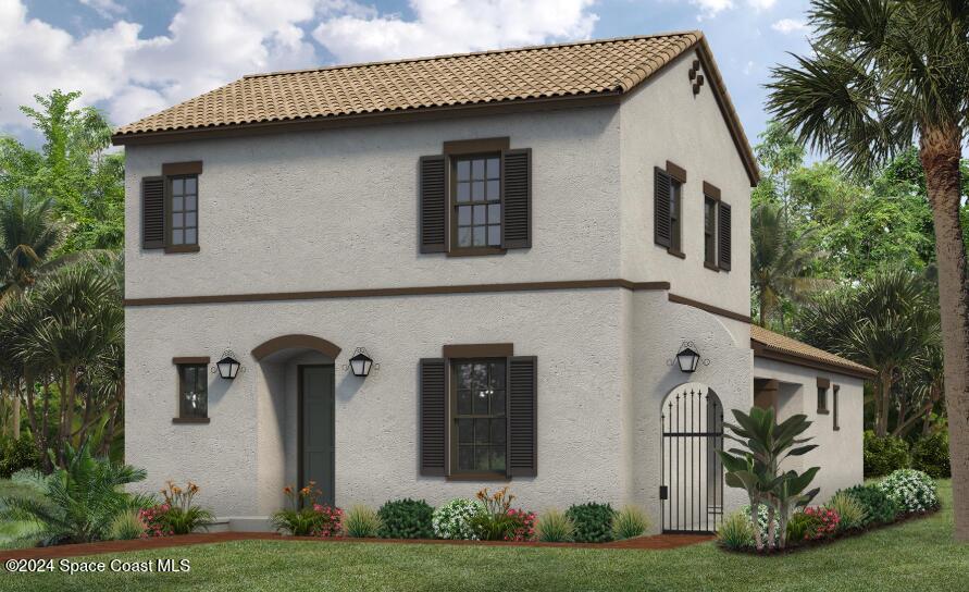 2225 Reeling Circle Melbourne, FL 32940 - Photo 1 of 3 a front view of a house with garden