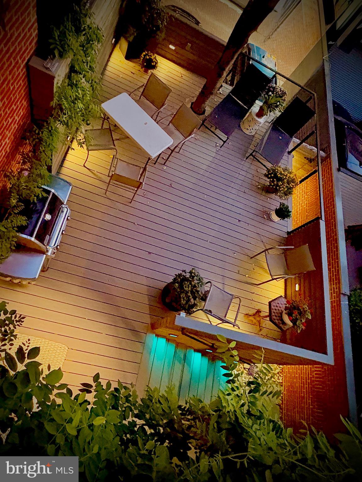 1420 Q Street Northwest Washington, DC 20009 - Photo 65 of 88 Twilight view of rear deck from above