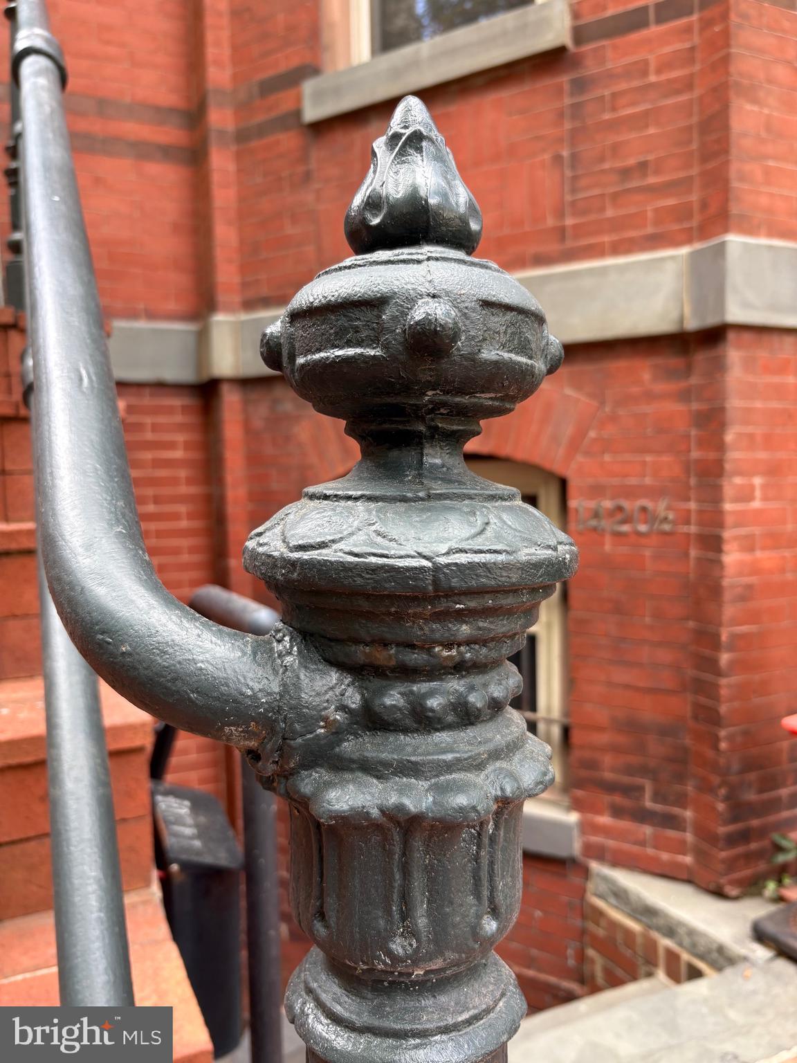 1420 Q Street Northwest Washington, DC 20009 - Photo 79 of 88 Original cast iron post on front porch railing