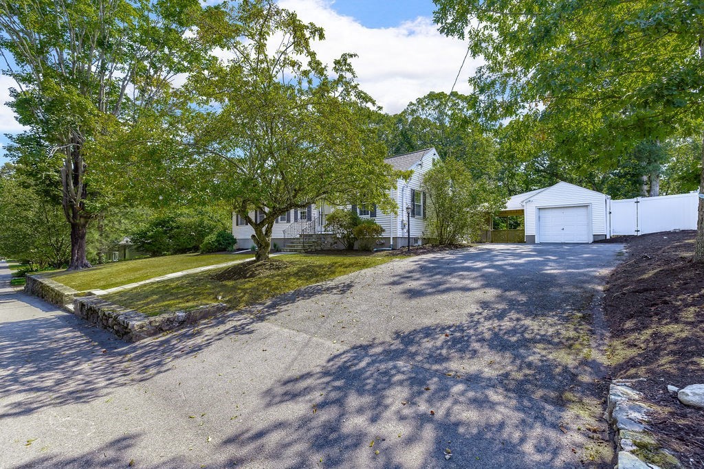 48 Taylor Street Needham, MA 02494 - Photo 2 of 25 a view of a house with a yard
