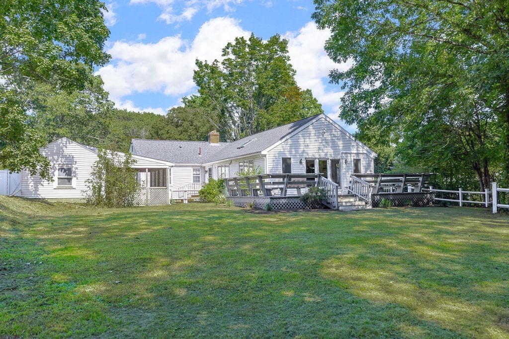 48 Taylor Street Needham, MA 02494 - Photo 24 of 25 a front view of a house with garden