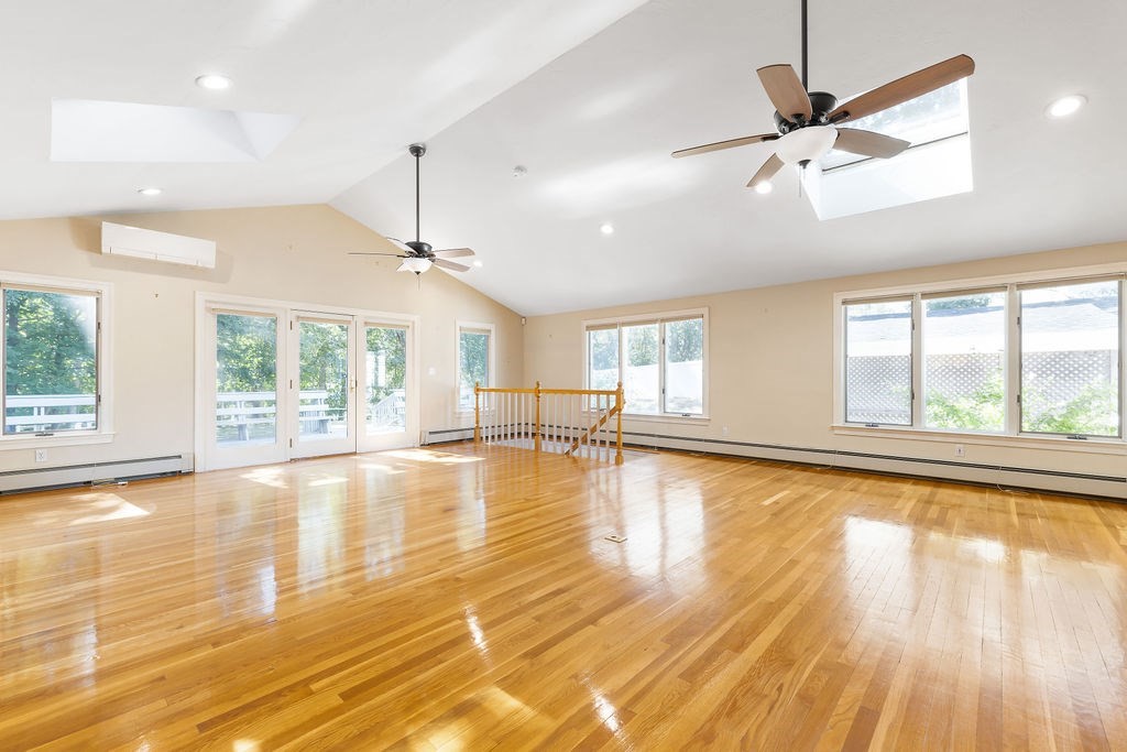 48 Taylor Street Needham, MA 02494 - Photo 6 of 25 a view of empty room with wooden floor and fan