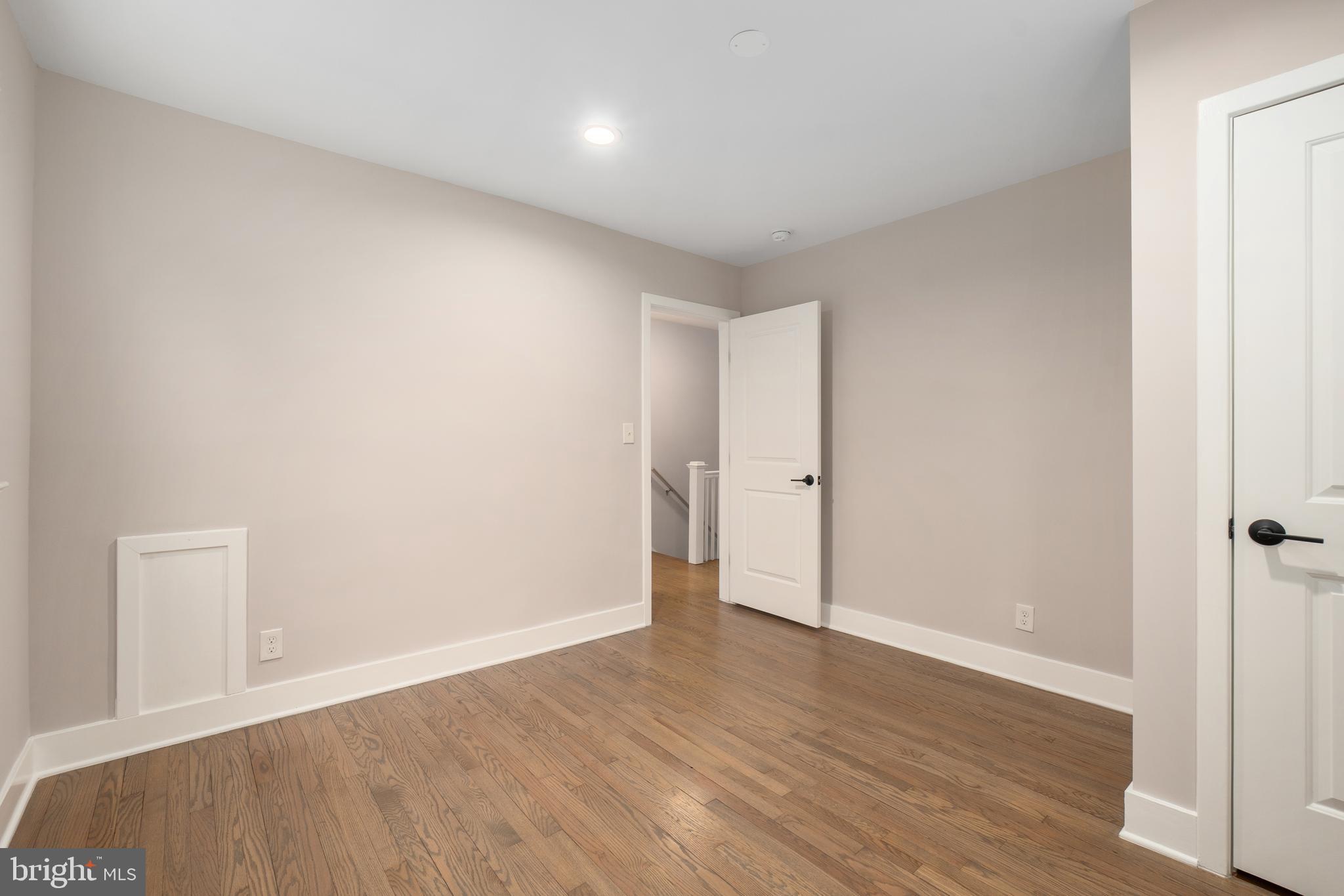 50 53rd Street Southeast Washington, DC 20019 - Photo 21 of 35 a view of an empty room with wooden floor