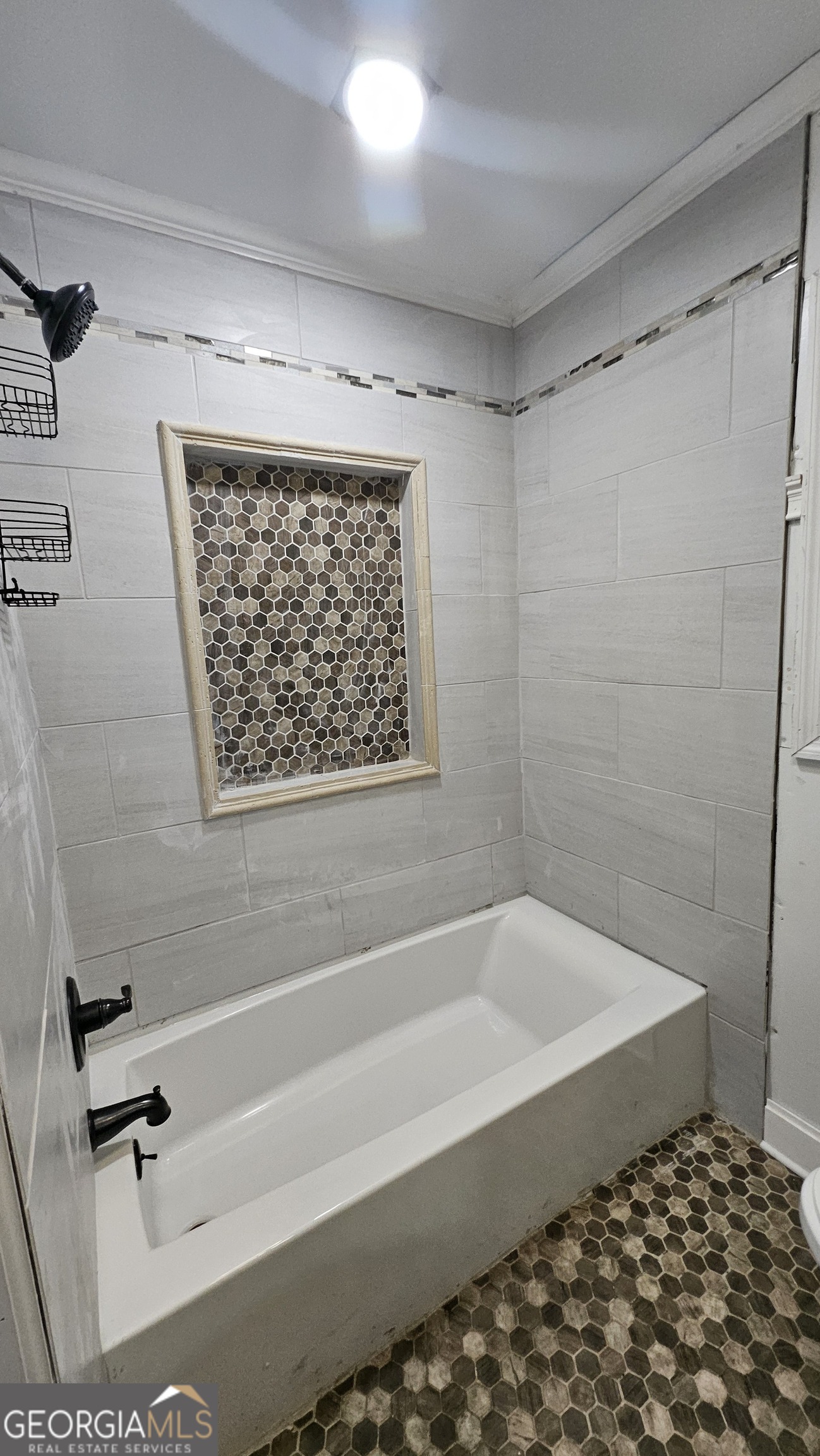 2197 Polar Rock Place Southwest Atlanta, GA 30315 - Photo 1 of 9 a bathroom with a bathtub and a shower