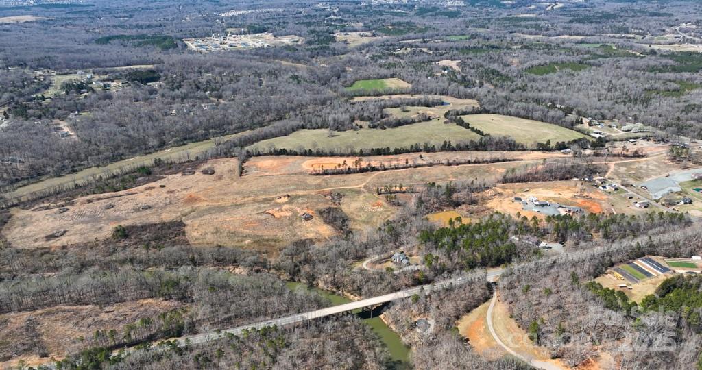 3500 Biggers Road Concord, NC 28025 - Photo 3 of 11 a view of a dry yard with wooden fence