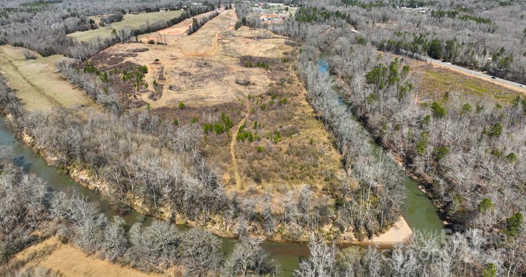 3500 Biggers Road Concord, NC 28025 - Photo 8 of 11 a view of a dry yard with trees