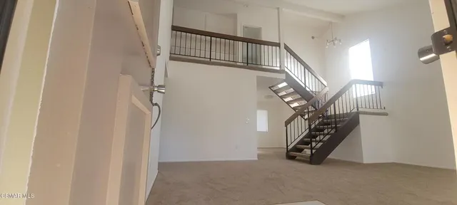 a view of an entryway with stairs