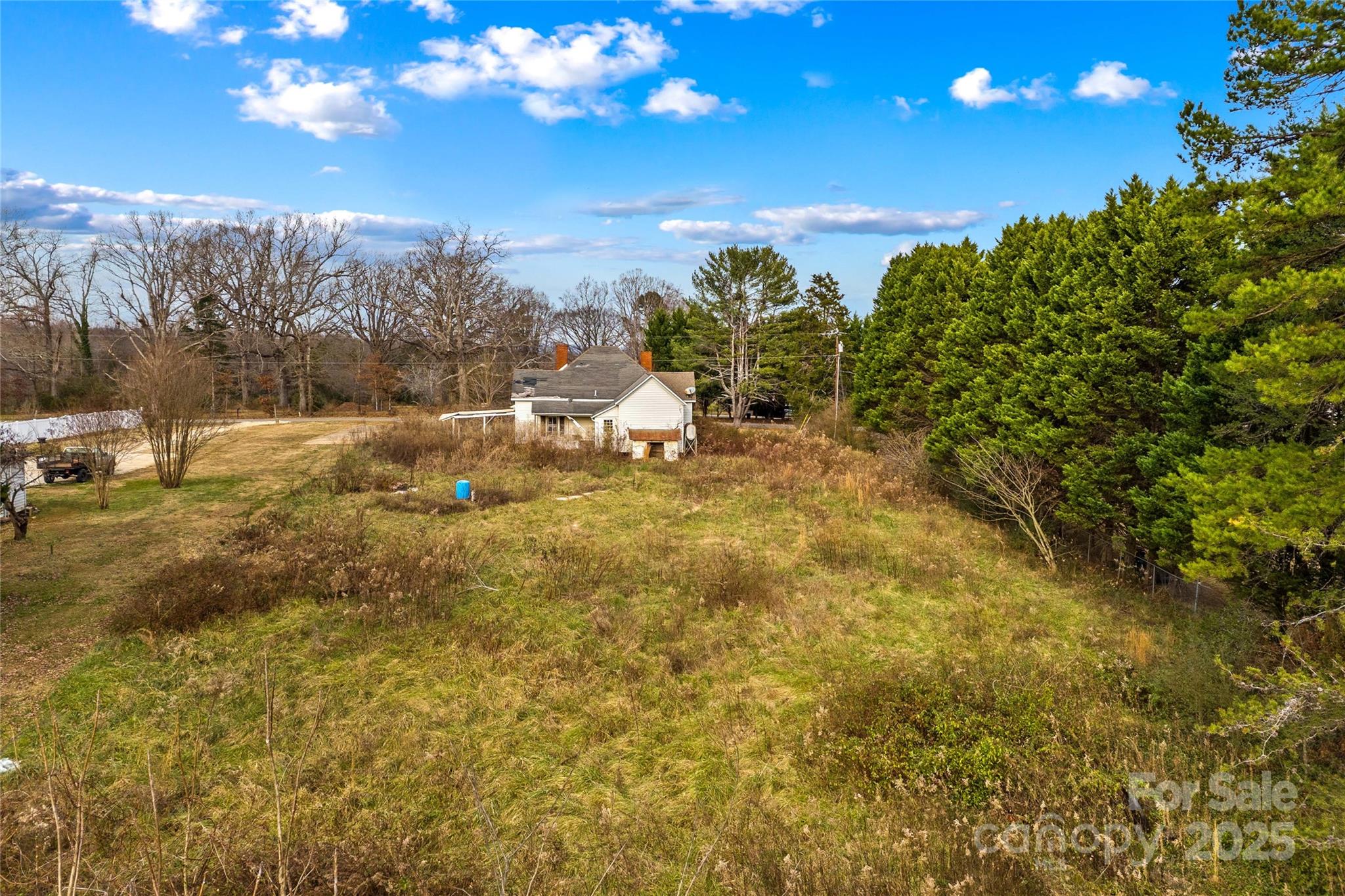 1091 Midway Road Statesville, NC 28625 - Photo 15 of 26 a view of a yard with an outdoor space