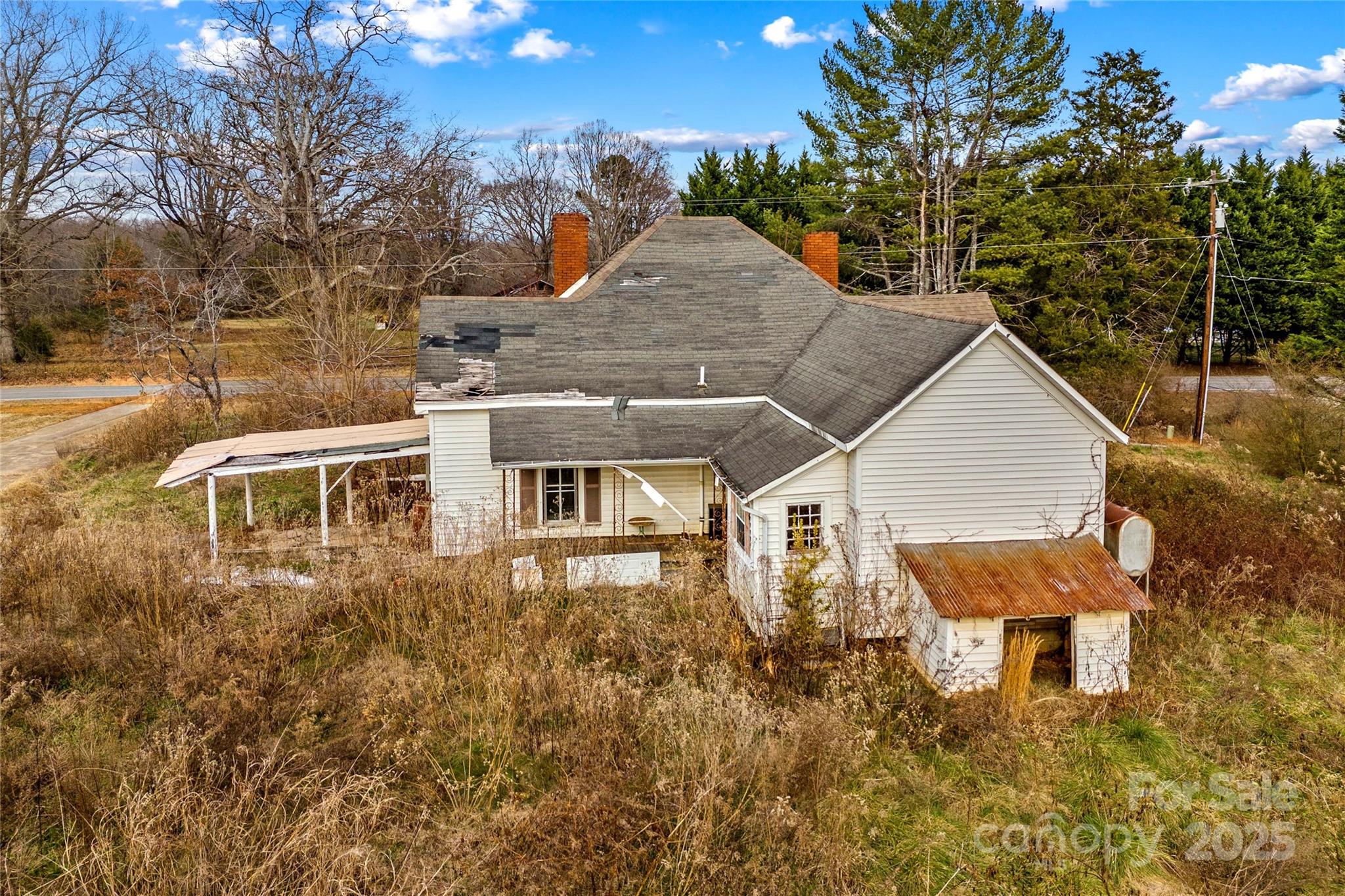 1091 Midway Road Statesville, NC 28625 - Photo 8 of 26 a backyard of a house with table and chairs