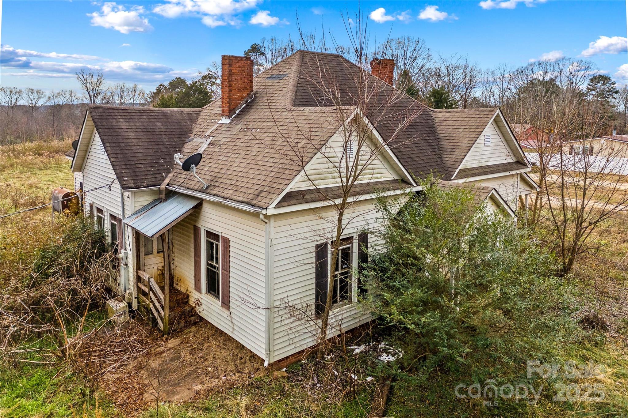 1091 Midway Road Statesville, NC 28625 - Photo 10 of 26 a view of a house with a yard