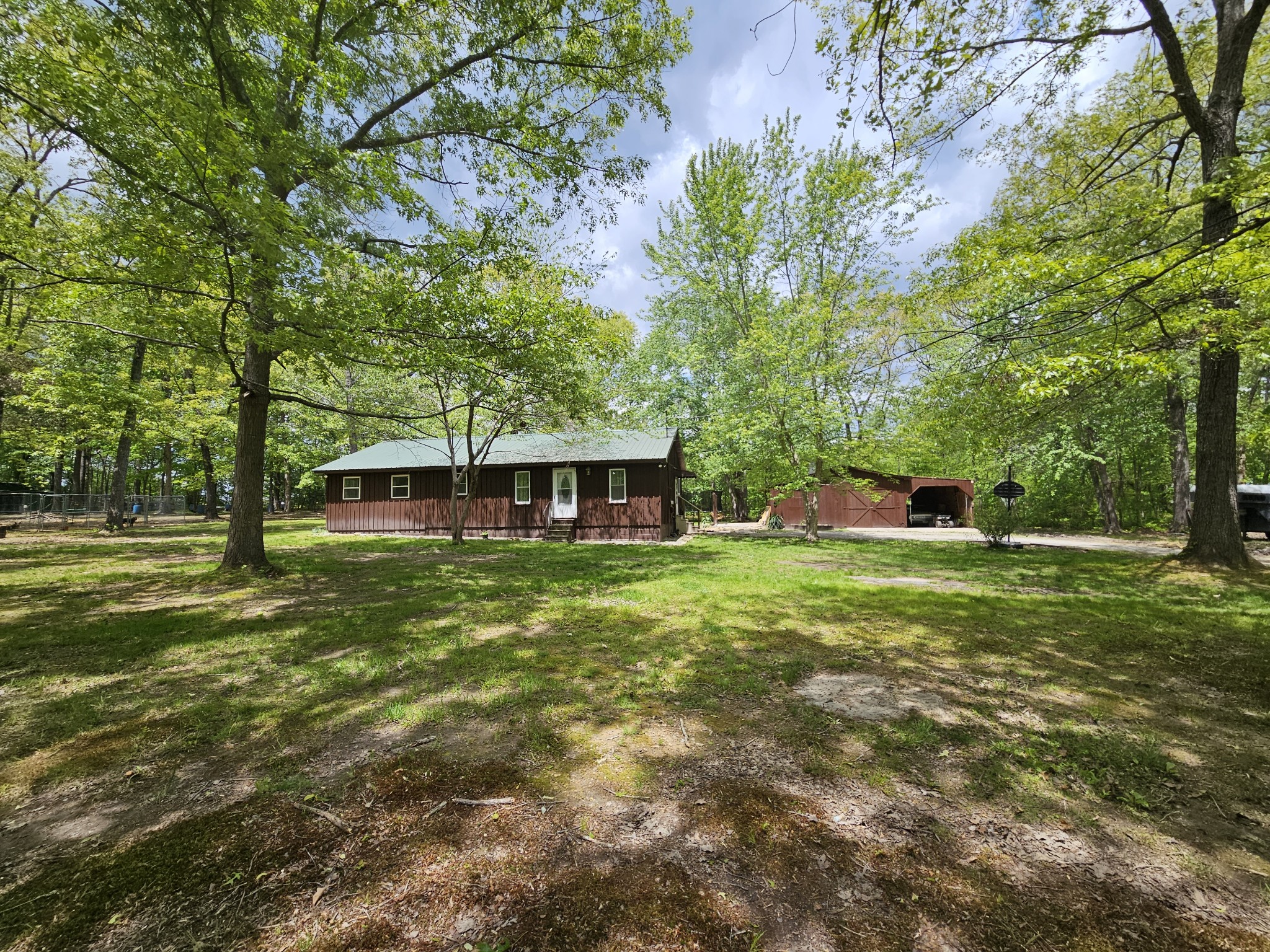 1883 Boynton Valley Road Manchester, TN 37355 - Photo 1 of 17 a view of a house with a yard