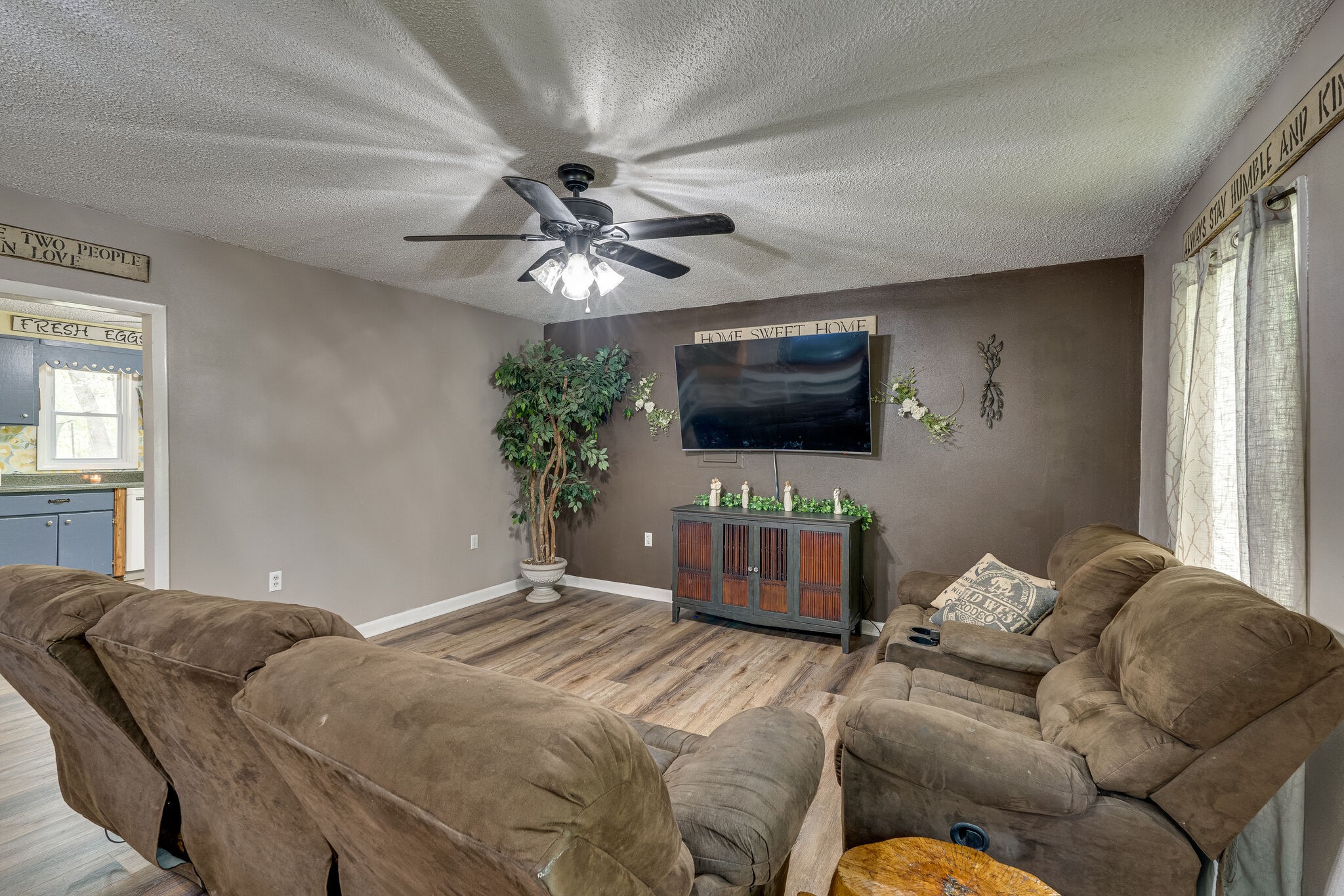 1883 Boynton Valley Road Manchester, TN 37355 - Photo 4 of 17 a bedroom with a bed and a flat screen tv