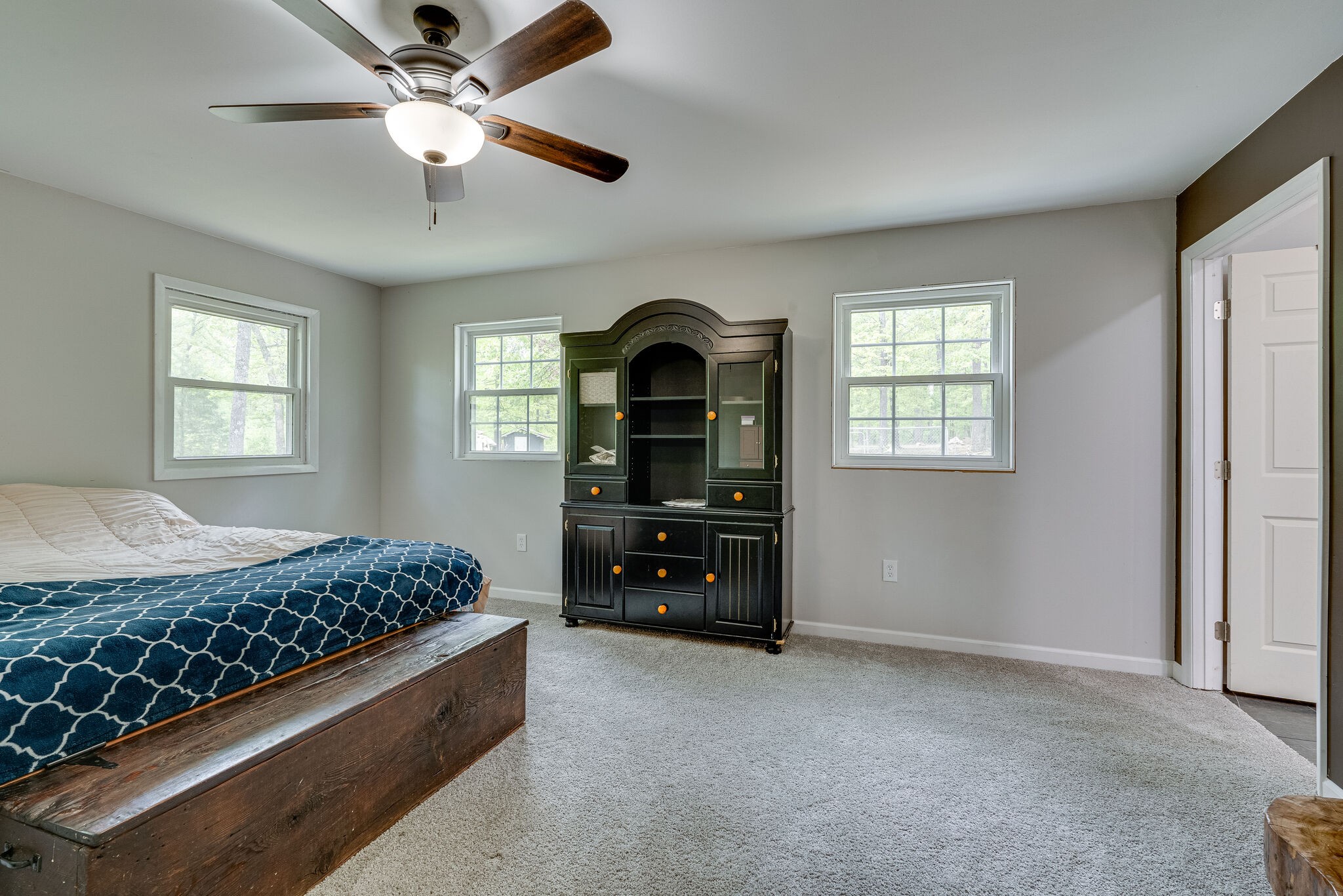 1883 Boynton Valley Road Manchester, TN 37355 - Photo 10 of 17 a bedroom with a bed and a chandelier
