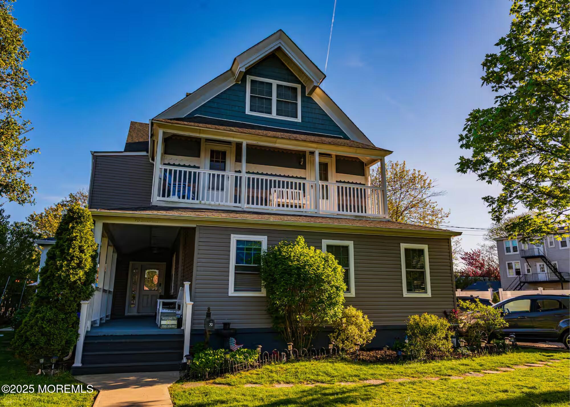 70 Bath Long Branch, Unit 1 Long Branch, NJ 07740 - Photo 1 of 22 a front view of a house with garden