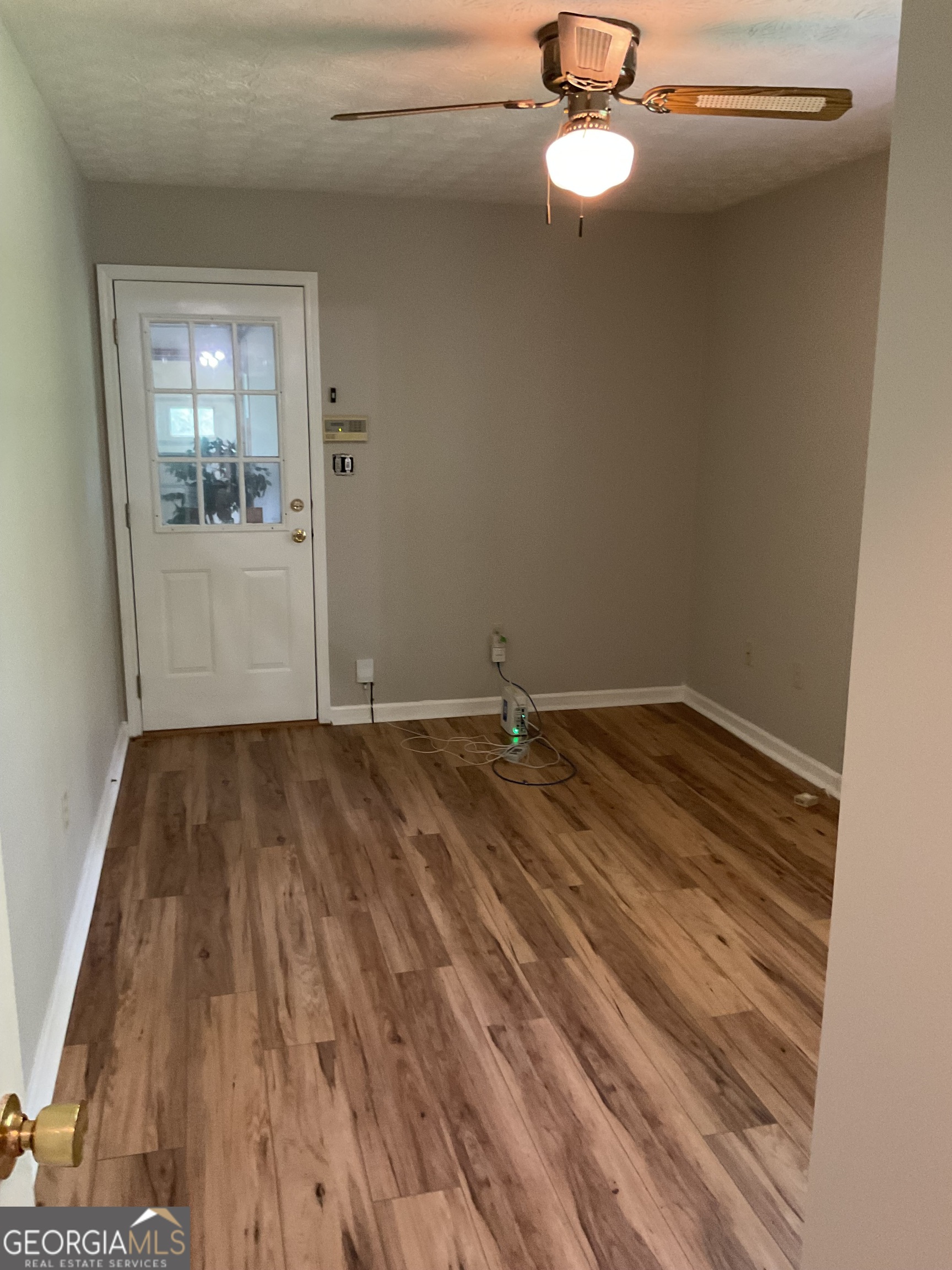 4800 Bethlehem Road Fairburn, GA 30213 - Photo 28 of 49 a view of a room with wooden floor and window