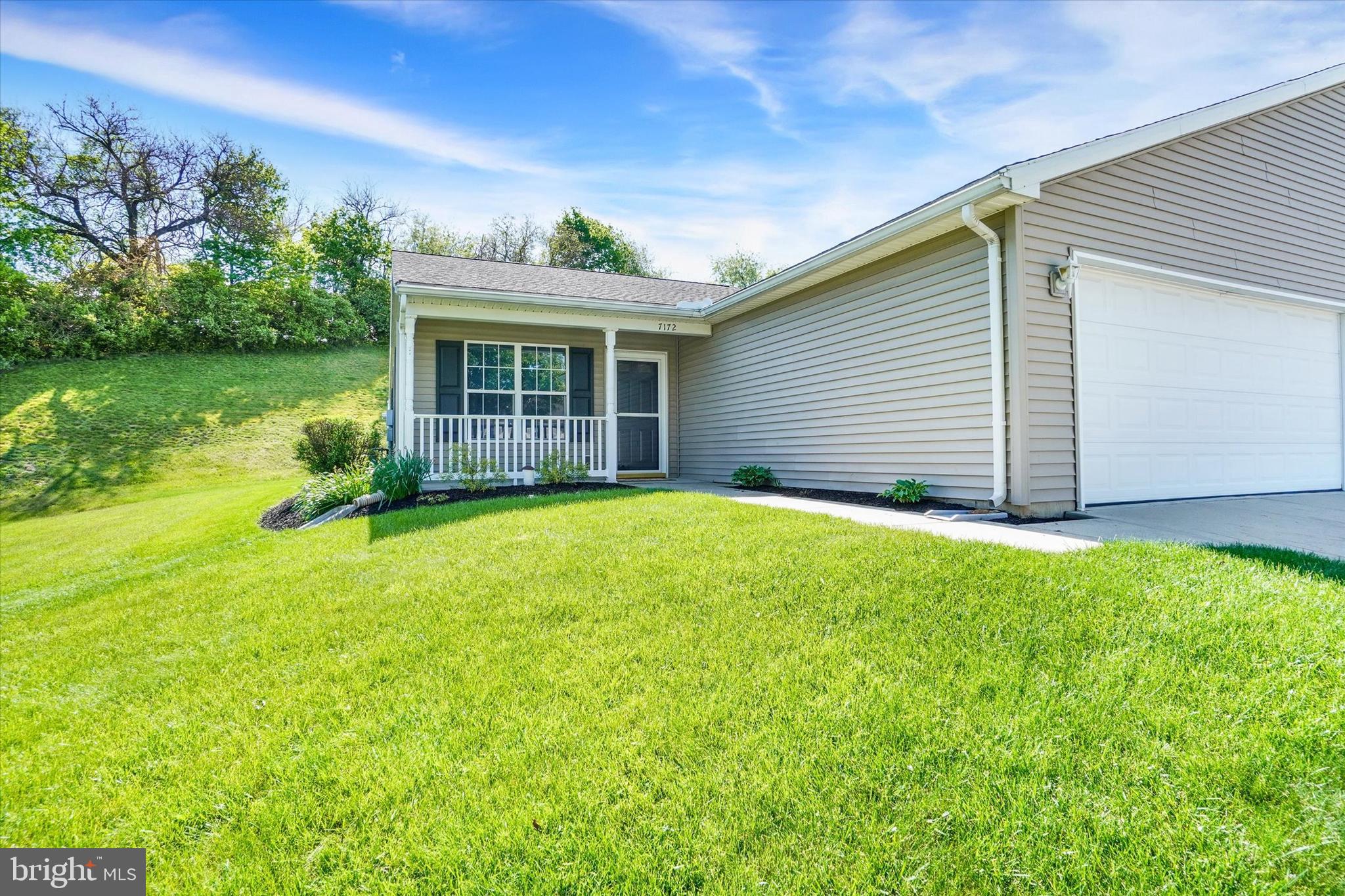 7172 Seneca Ridge Drive York, PA 17403 - Photo 2 of 18 a view of a house with backyard and garden