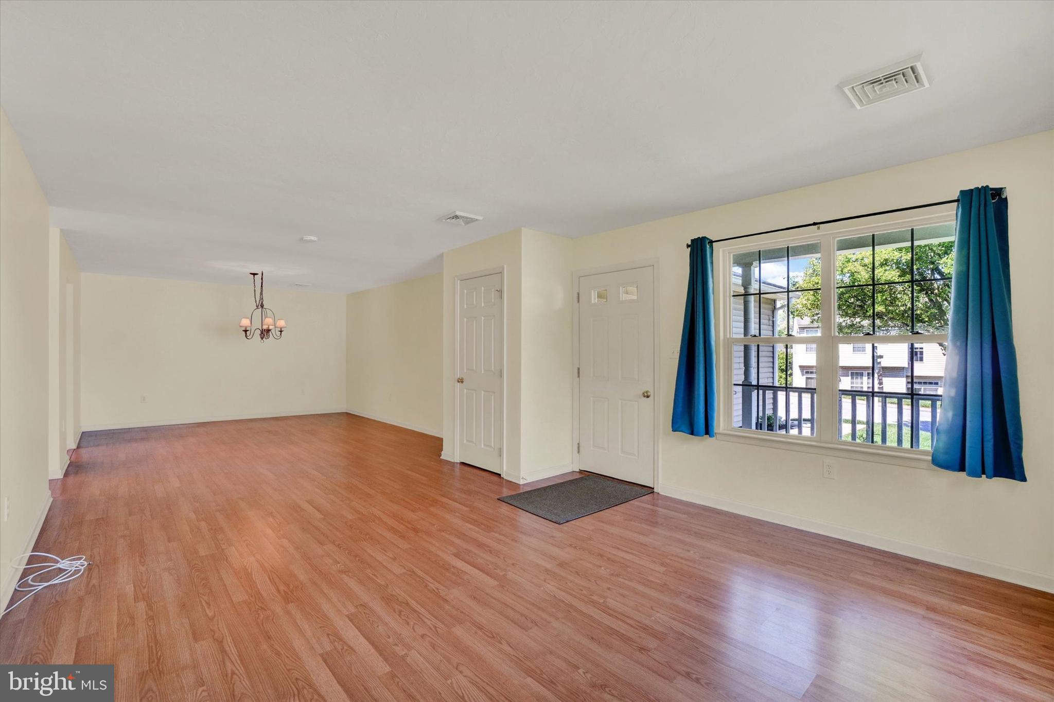 7172 Seneca Ridge Drive York, PA 17403 - Photo 4 of 18 a view of empty room with wooden floor and fan