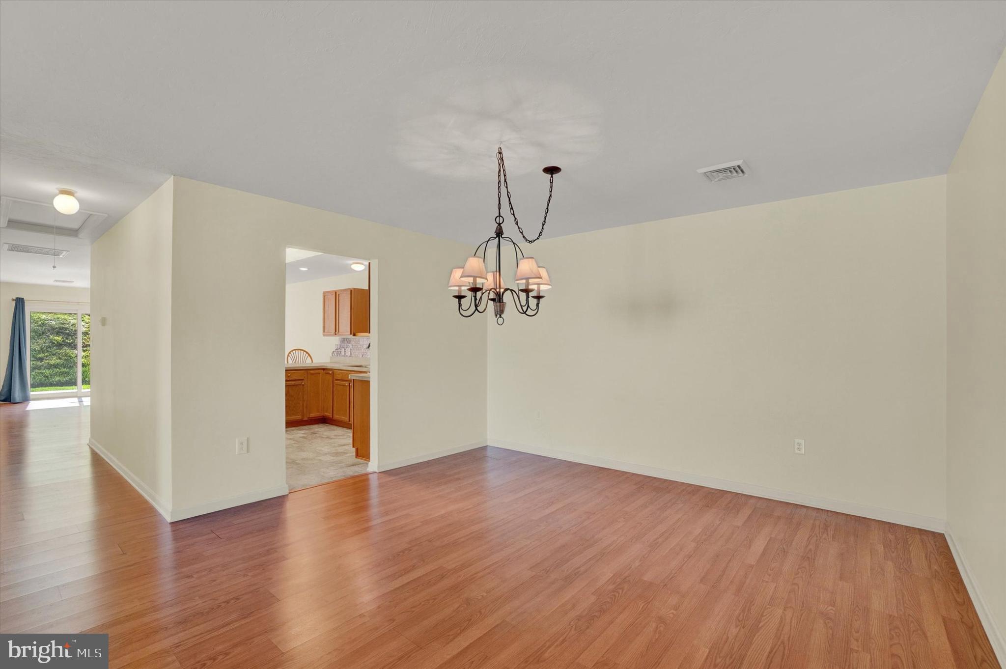 7172 Seneca Ridge Drive York, PA 17403 - Photo 6 of 18 a view of a room with wooden floor and a ceiling fan