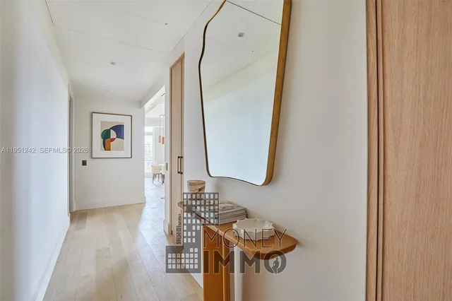 a bathroom with a mirror and a sink