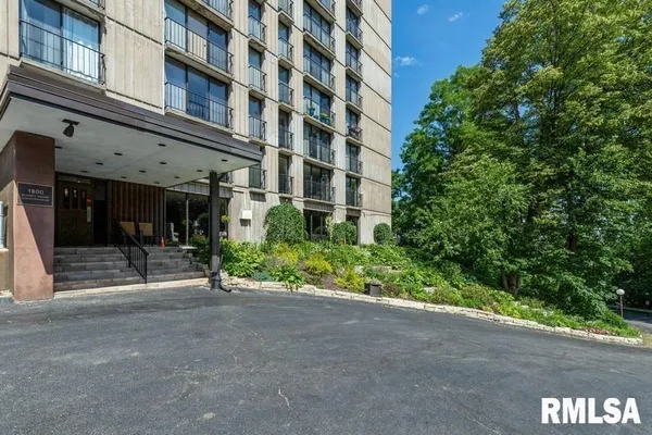 a view of a building with garden