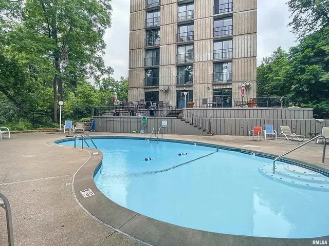 a view of a chairs and tables in the kitchen