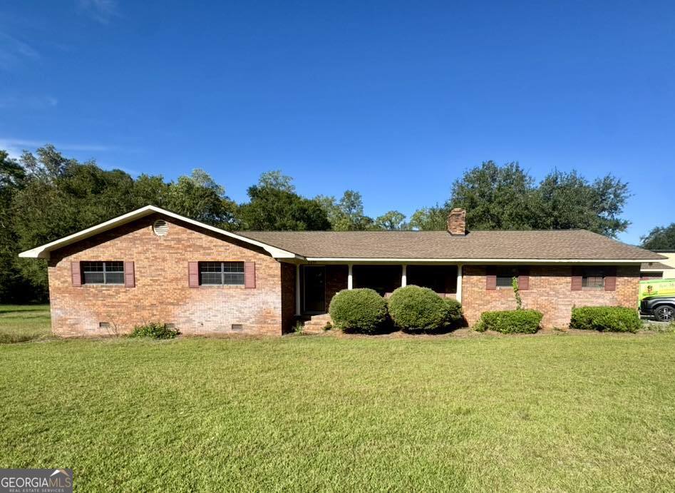 2471 Highway 441 Dublin, GA 31021 - Photo 1 of 18 a front view of a house with a yard