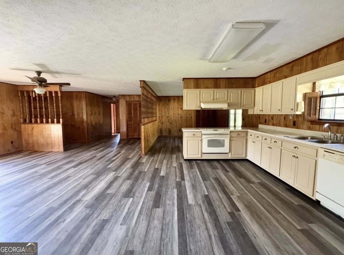 2471 Highway 441 Dublin, GA 31021 - Photo 3 of 18 a kitchen with a sink and wooden floor