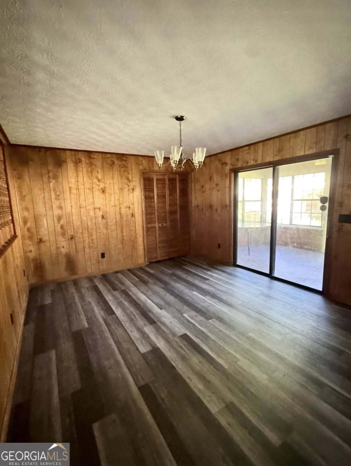 2471 Highway 441 Dublin, GA 31021 - Photo 4 of 18 wooden floor in an empty room with a window