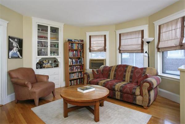 82 Walnut Street, Unit 3 Brookline, MA 02445 - Photo 4 of 4 a living room with furniture and a large window