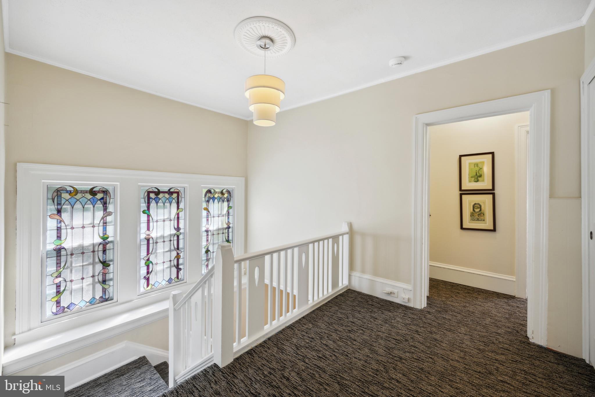 105 Woodside Road Ardmore, PA 19003 - Photo 25 of 59 Staircase with Stained Glass Windows