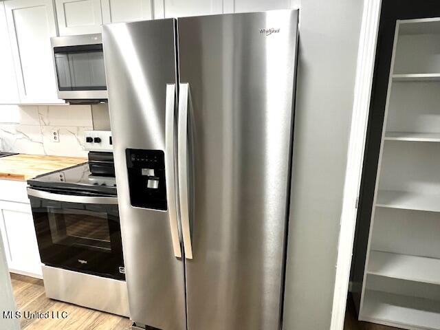 14151 Highway 35 Kosciusko, MS 39090 - Photo 13 of 32 New Side-by-Side Refrigerator