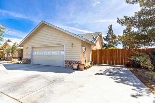 422 Vista Street Ridgecrest, CA 93555 - Photo 38 of 38 a view of a house with wooden fence
