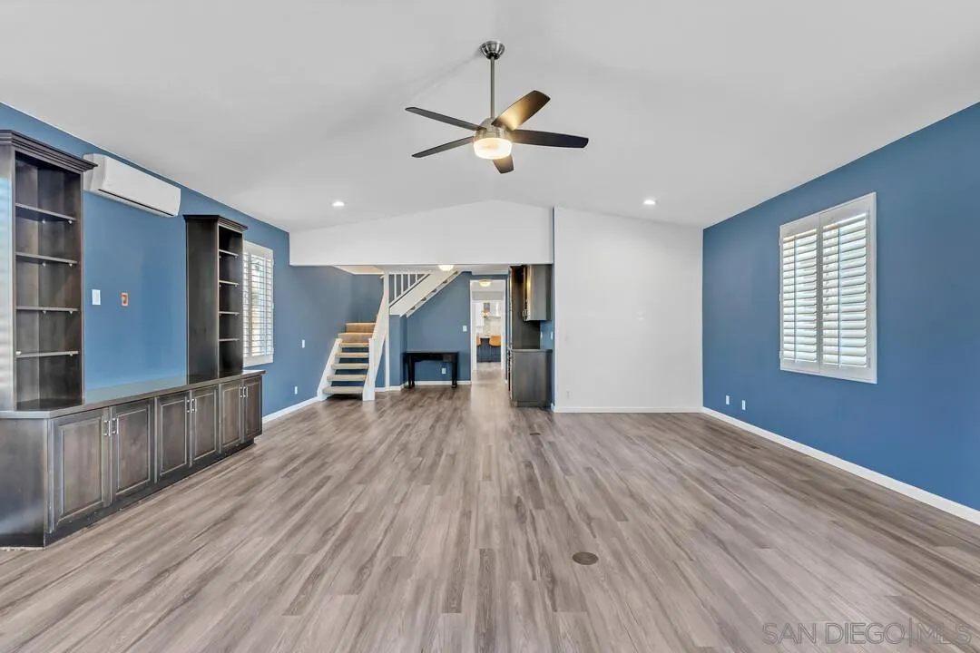 4502 Milton Street San Diego, CA 92110 - Photo 15 of 51 a view of empty room with wooden floor