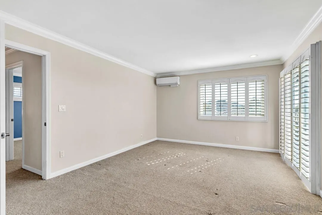 4502 Milton Street San Diego, CA 92110 - Photo 19 of 51 an empty room with windows