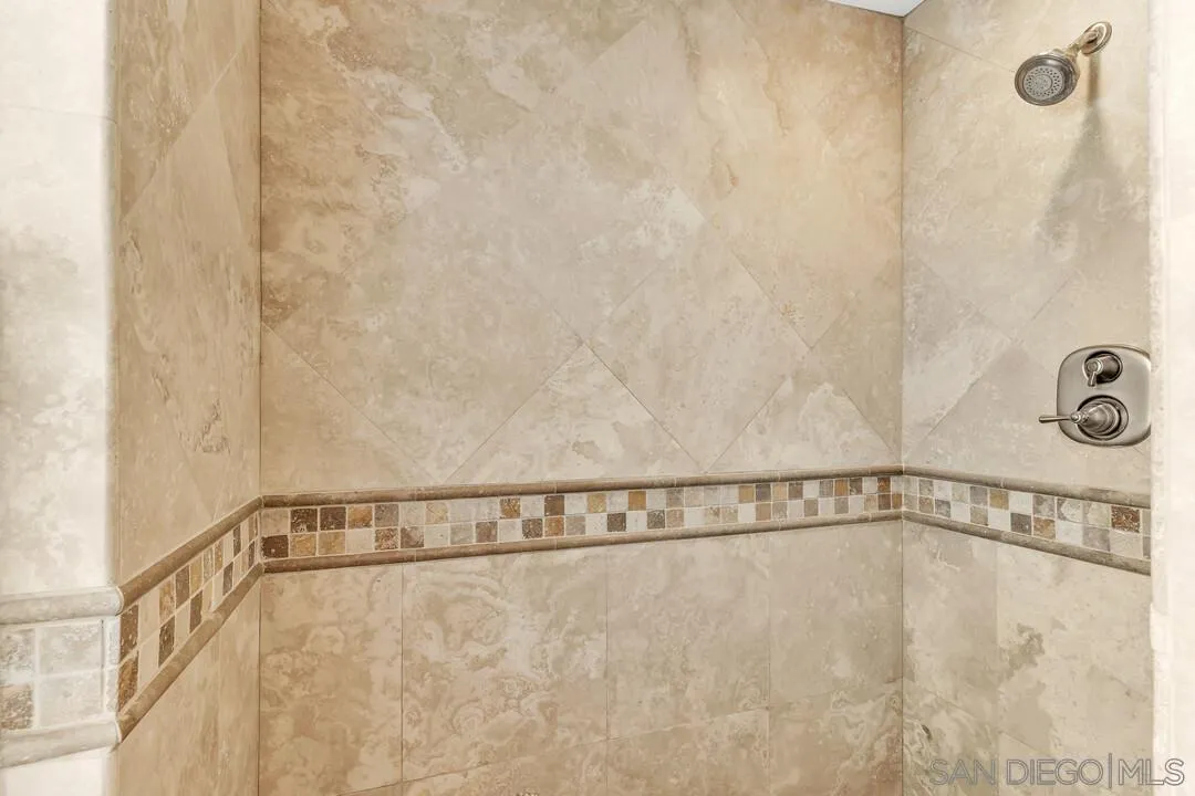 4502 Milton Street San Diego, CA 92110 - Photo 26 of 51 a close view of a shower in the bathroom