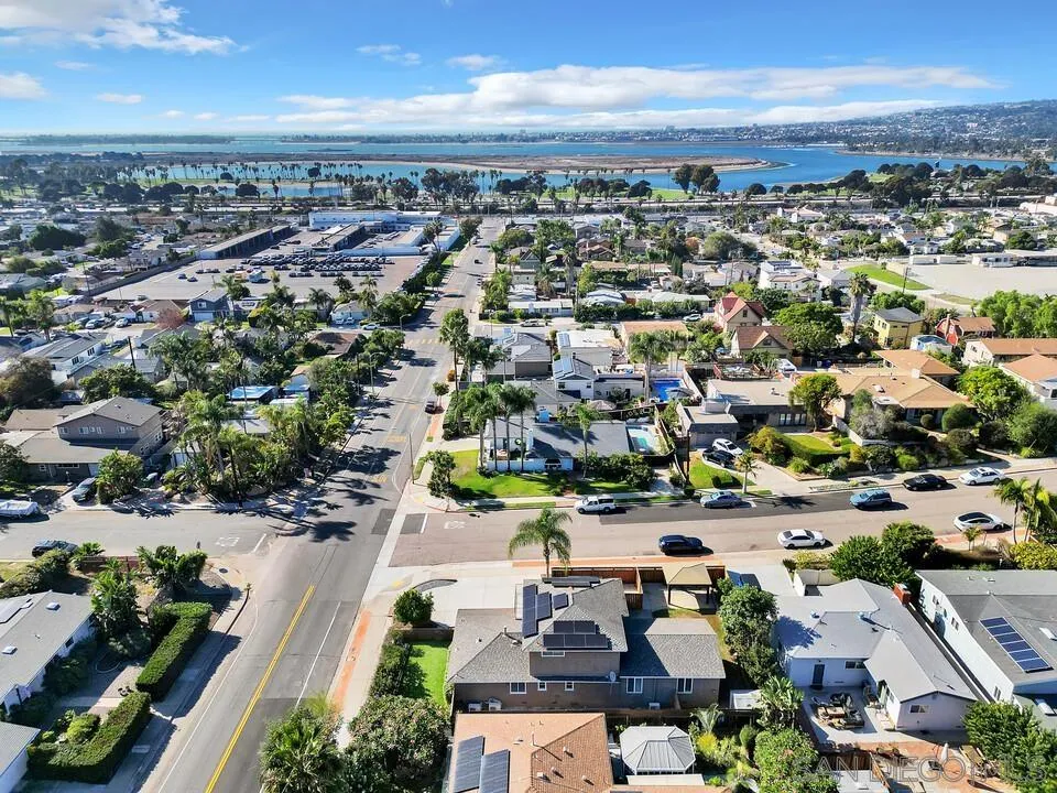 4502 Milton Street San Diego, CA 92110 - Photo 47 of 51 an aerial view of a city with lots of residential buildings and ocean view in back
