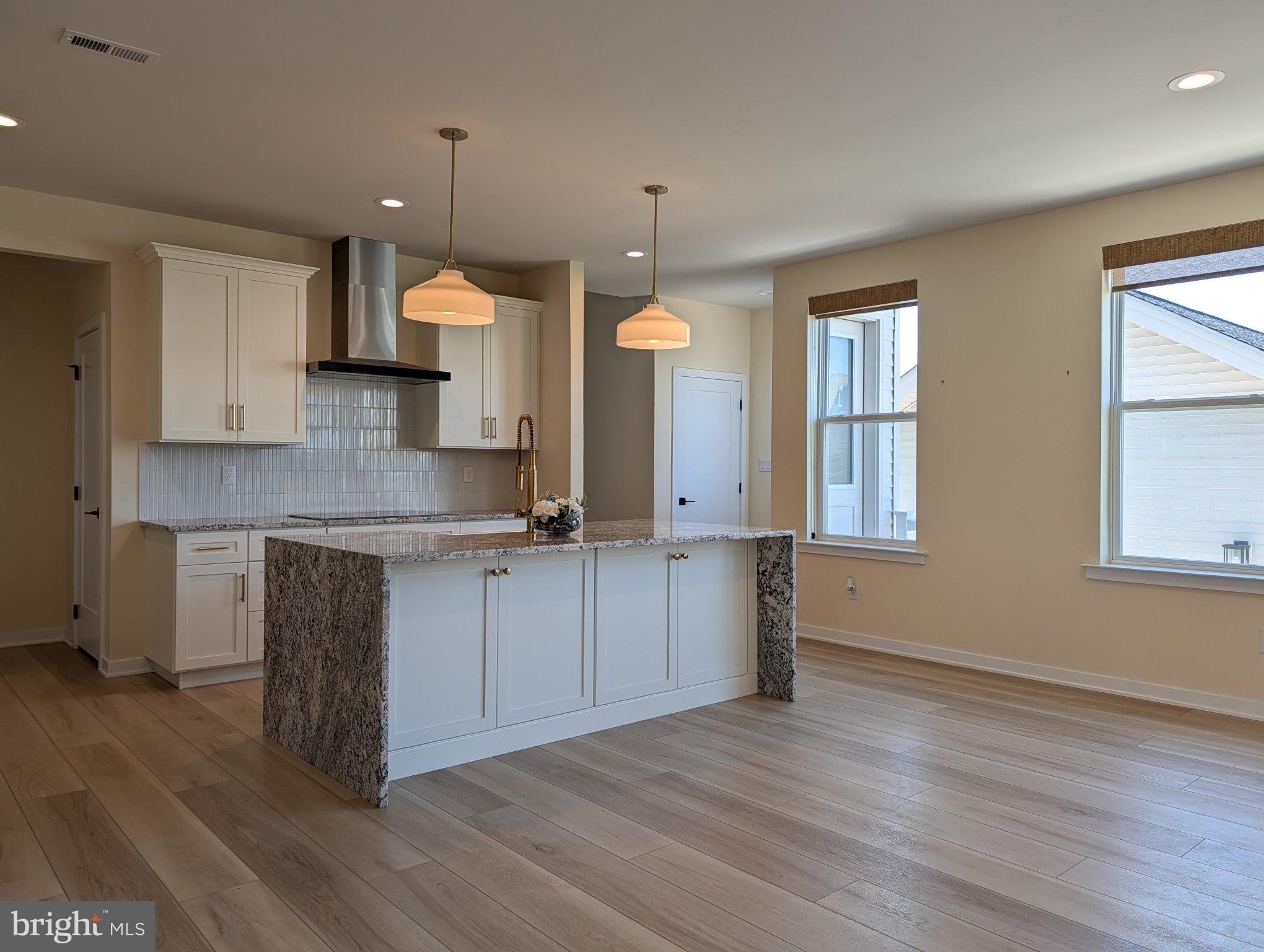 141 South Lore's Landing Road Middletown, DE 19709 - Photo 16 of 60 a kitchen with a refrigerator and window