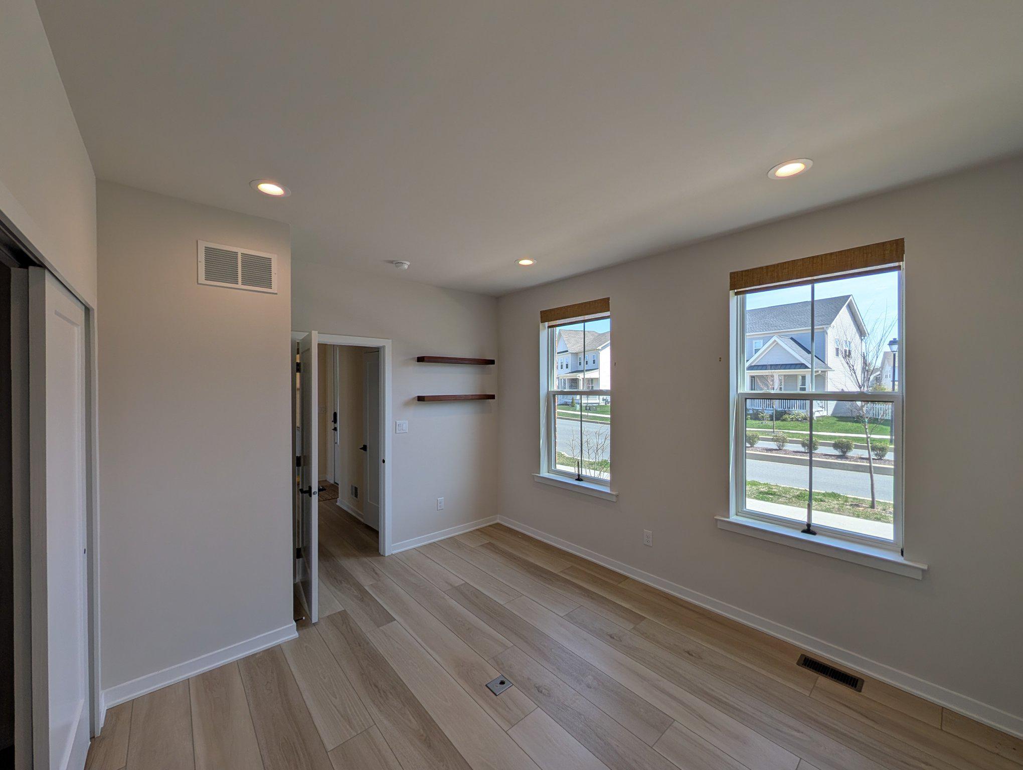 141 South Lore's Landing Road Middletown, DE 19709 - Photo 22 of 60 wooden floor in an empty room with a window
