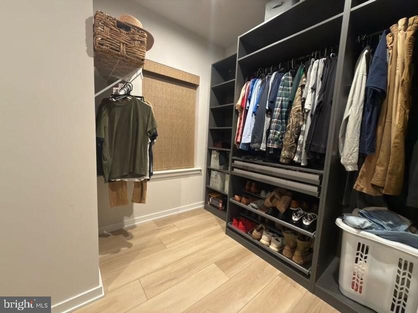 141 South Lore's Landing Road Middletown, DE 19709 - Photo 25 of 38 a view of walk in closet with clothes and shoes