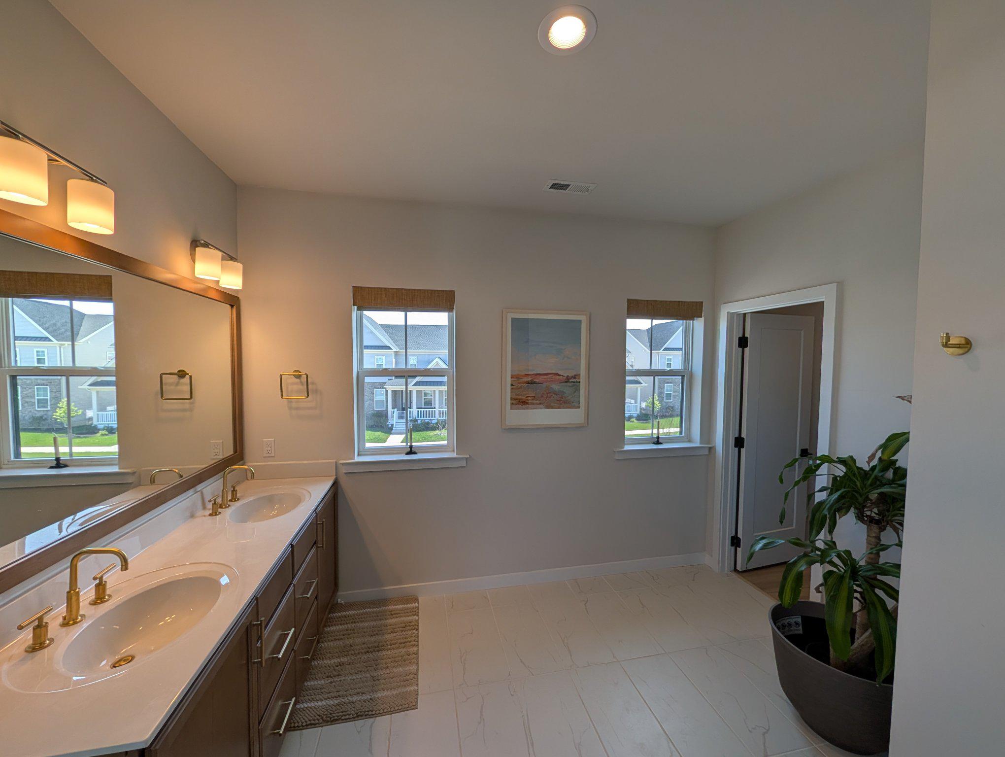 141 South Lore's Landing Road Middletown, DE 19709 - Photo 26 of 60 a spacious bathroom with a double vanity sink a window and a shower