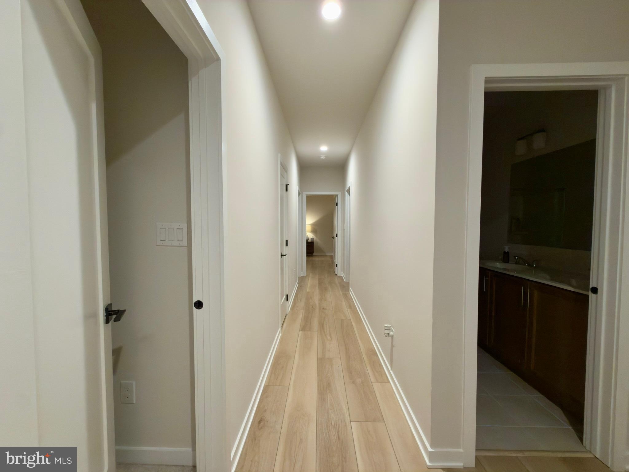 141 South Lore's Landing Road Middletown, DE 19709 - Photo 26 of 38 a view of a hallway with wooden floor and staircase