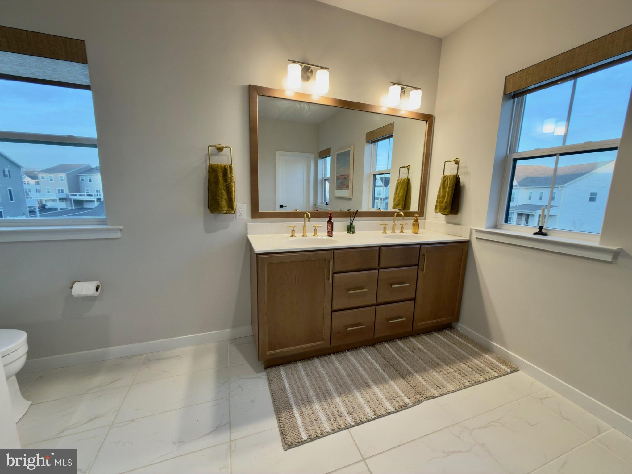 141 South Lore's Landing Road Middletown, DE 19709 - Photo 29 of 60 a bathroom with a sink mirror and toilet