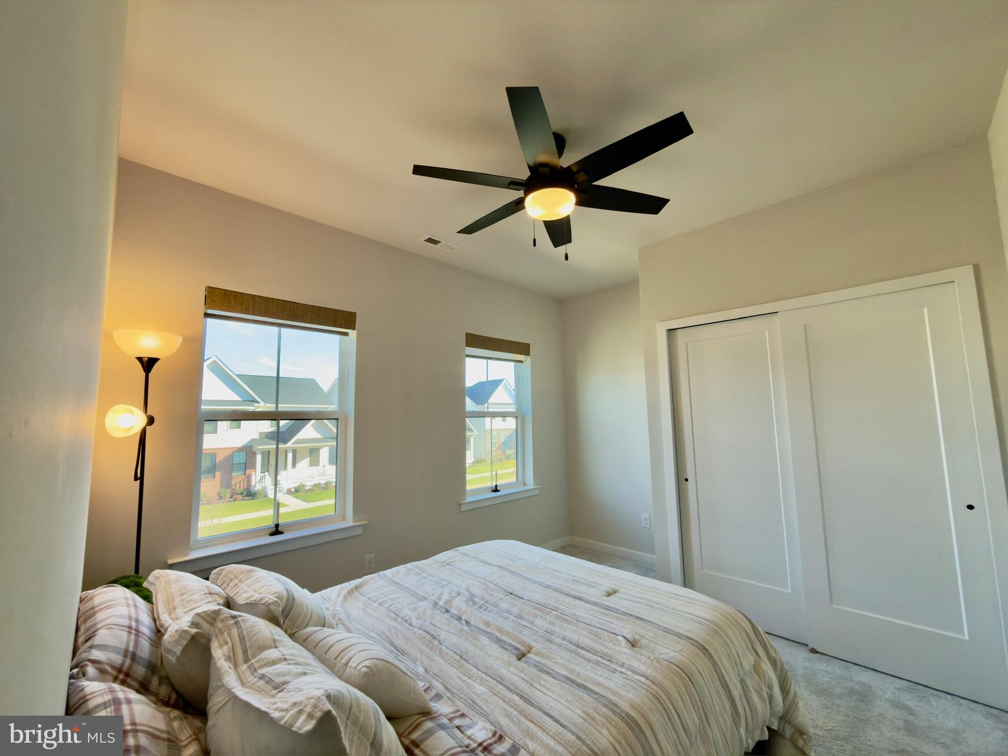 141 South Lore's Landing Road Middletown, DE 19709 - Photo 30 of 38 a bedroom with a bed and a window