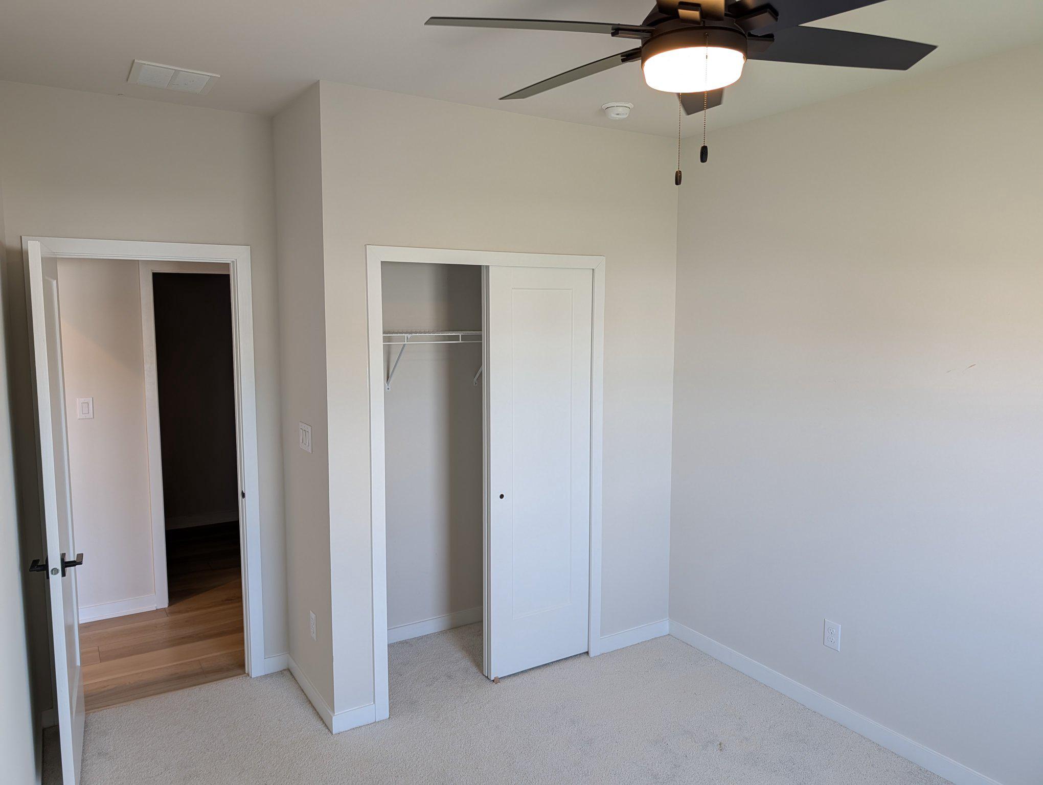 141 South Lore's Landing Road Middletown, DE 19709 - Photo 43 of 60 an empty room with a chandelier fan