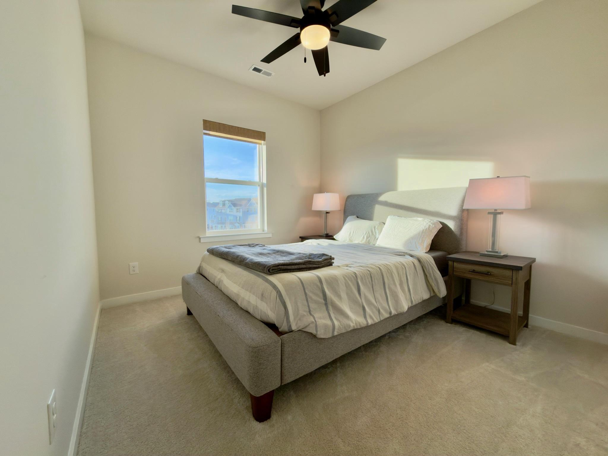 141 South Lore's Landing Road Middletown, DE 19709 - Photo 45 of 60 a bedroom with a bed and lamp