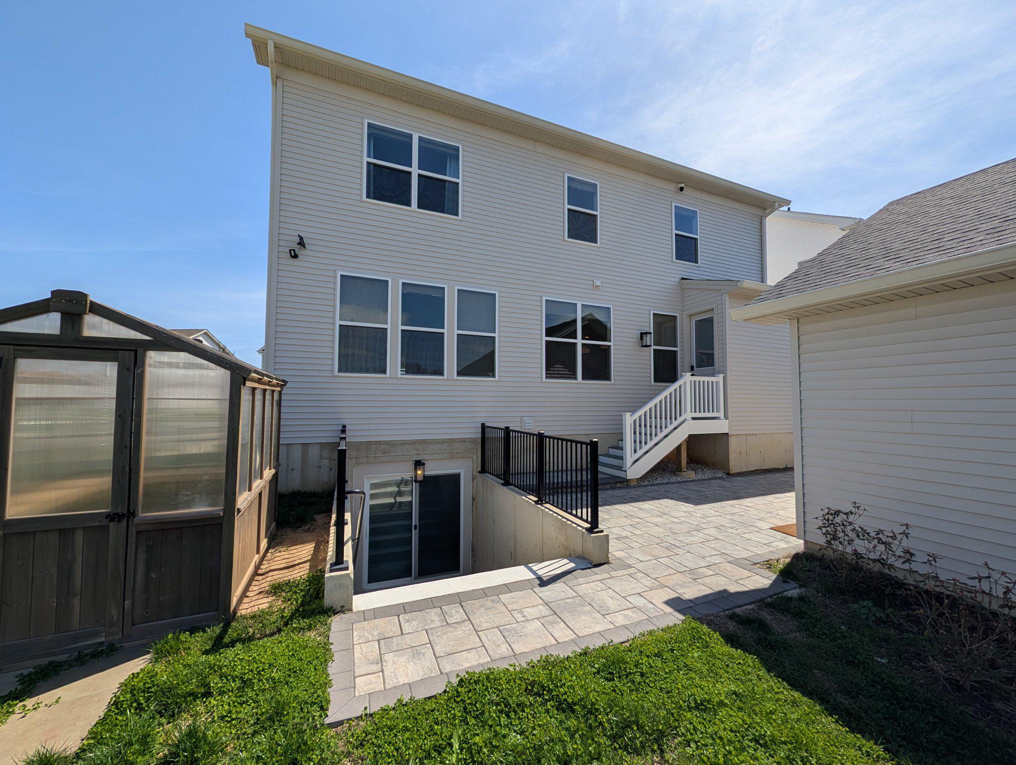 141 South Lore's Landing Road Middletown, DE 19709 - Photo 50 of 60 a view of a house with backyard and wooden fence