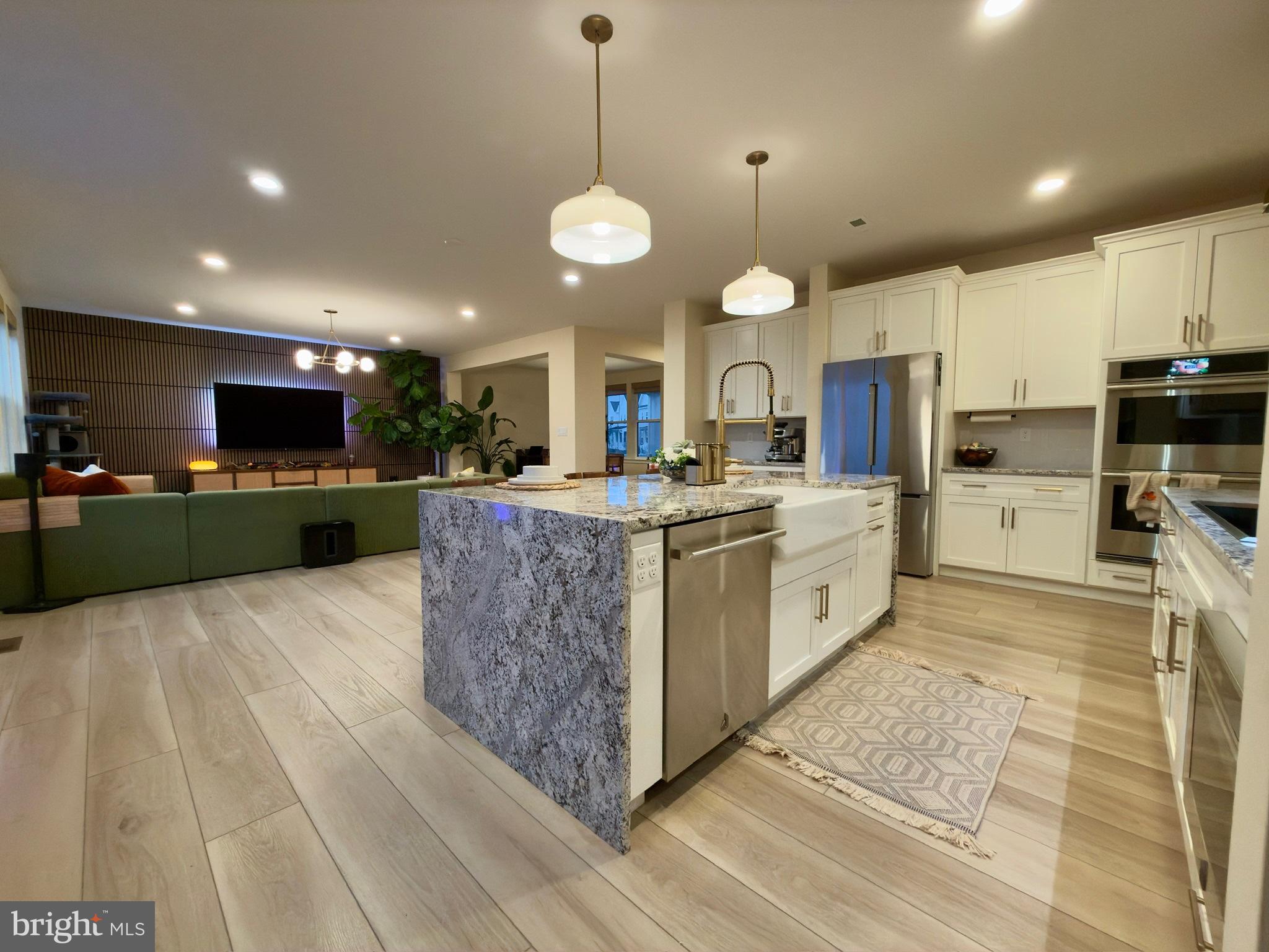 141 South Lore's Landing Road Middletown, DE 19709 - Photo 6 of 38 a large kitchen with kitchen island a large island in it