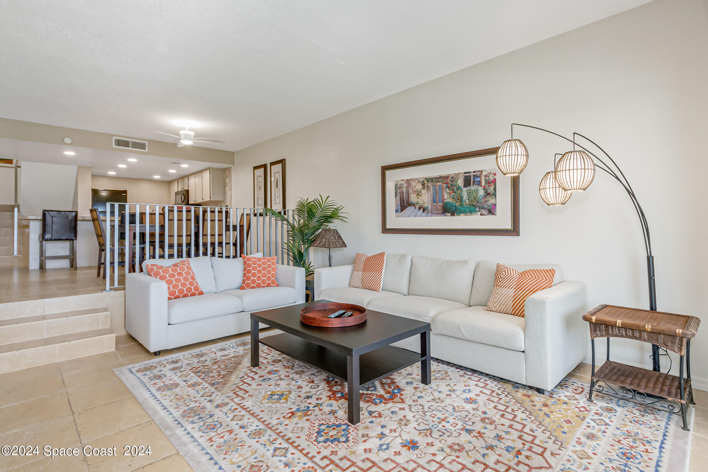 5050 Ocean Beach Boulevard Cocoa Beach, FL 32931 - Photo 20 of 33 a living room with furniture and wooden floor
