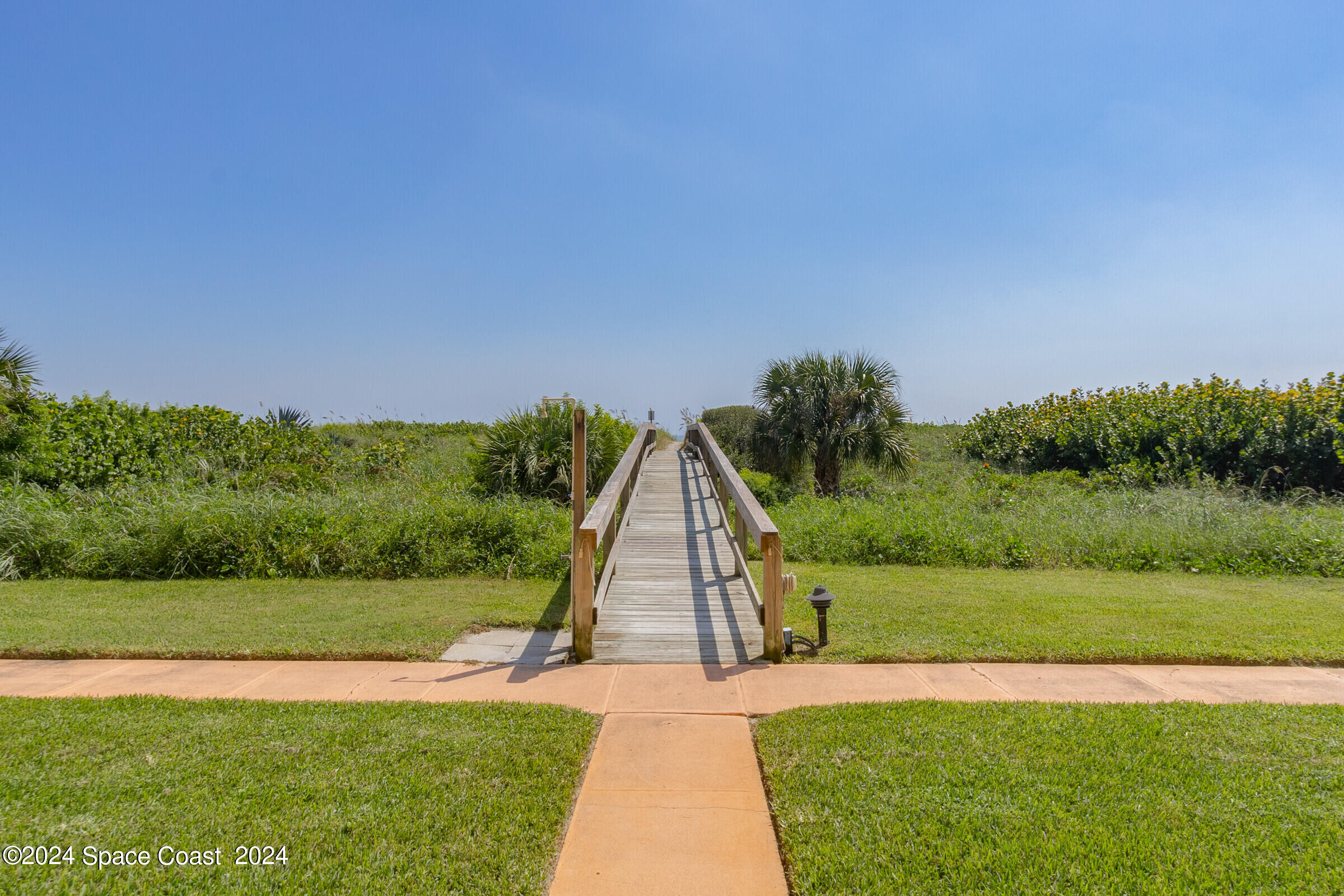 5050 Ocean Beach Boulevard Cocoa Beach, FL 32931 - Photo 30 of 33 a view of a park with large trees