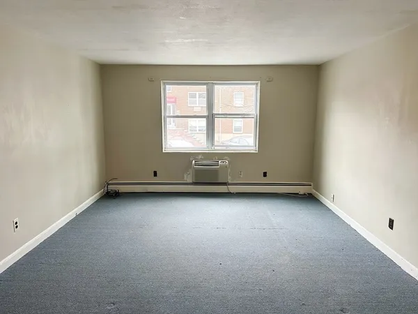 an empty room with a window